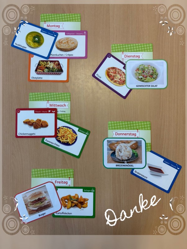 Die Kinder machen ihren Wunschspeiseplan für eine Woche.