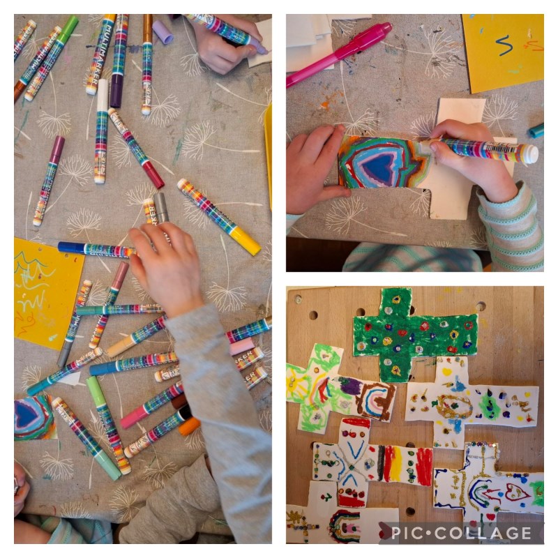 Die Vorschulkinder der Igelgruppe basteln ein Holzkreuz.